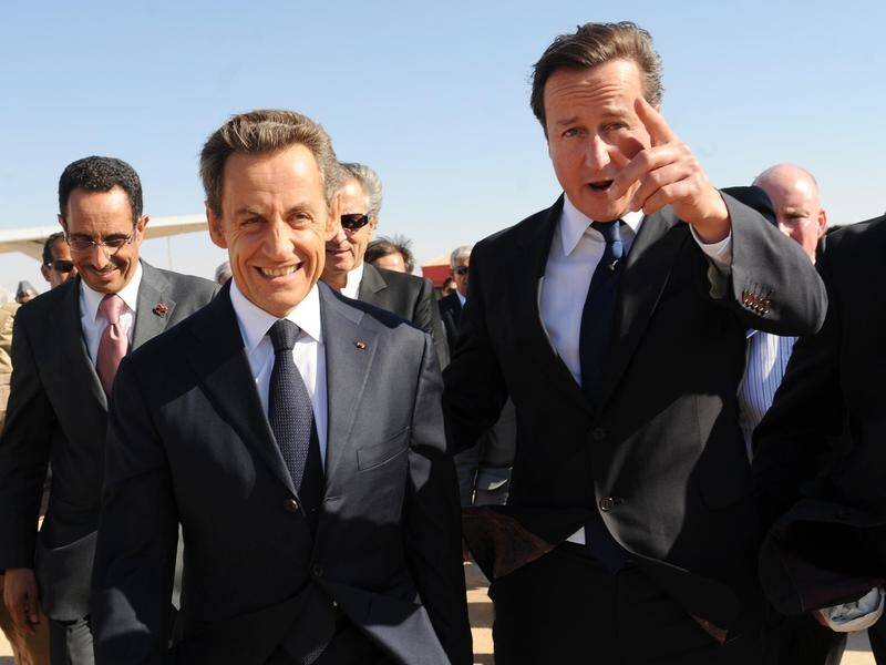 David Cameron (R) says Nicolas Sarkozy (L) helped him see his father for the last time.