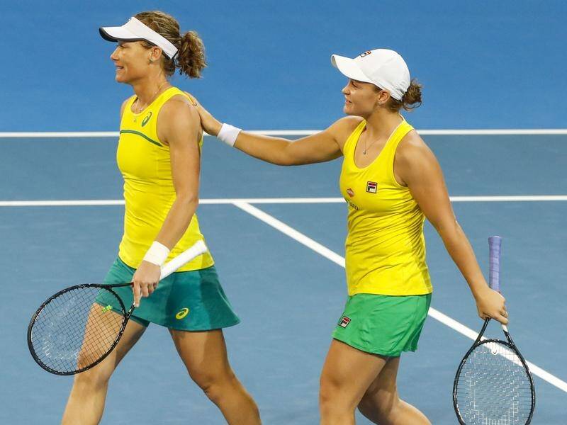 Sam Stosur (L) will happily make way for Ajla Tomljanovic to team with Ashleigh Barty in the Fed Cup