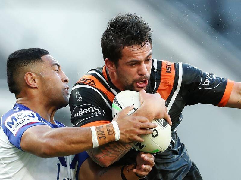 Wests Tigers are adamant Josh Aloiai (r) won't be released from his contract early.
