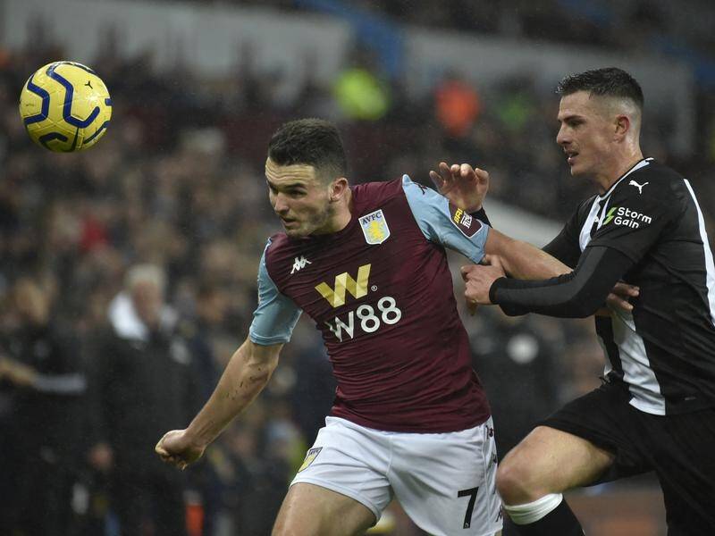 Aston Villa's John McGinn (L) is set for a layoff after fracturing his ankle against Southampton.
