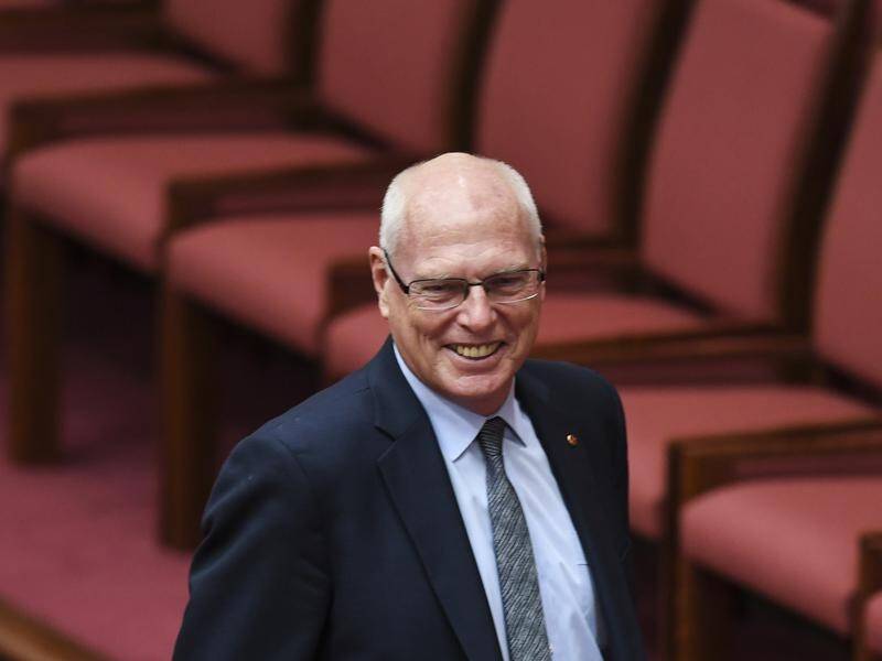 New Liberal senator Jim Molan, who posted videos from a far-right group, denies he is a racist.