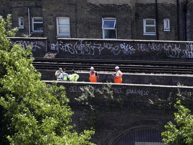 Three men who died after being struck by a train in south London may have been graffiti artists.