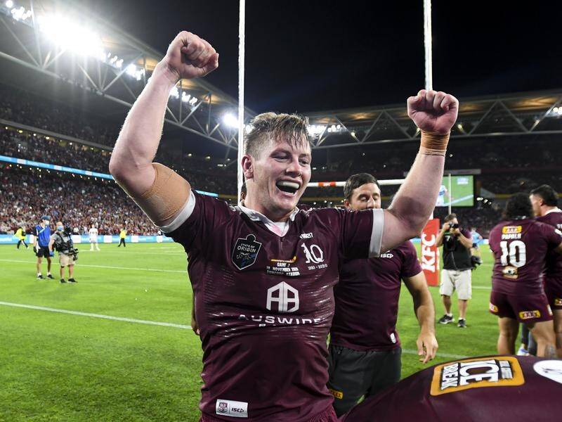 Harry Grant celebrates a breakthrough game for him and a State of Origin victory for the Maroons.