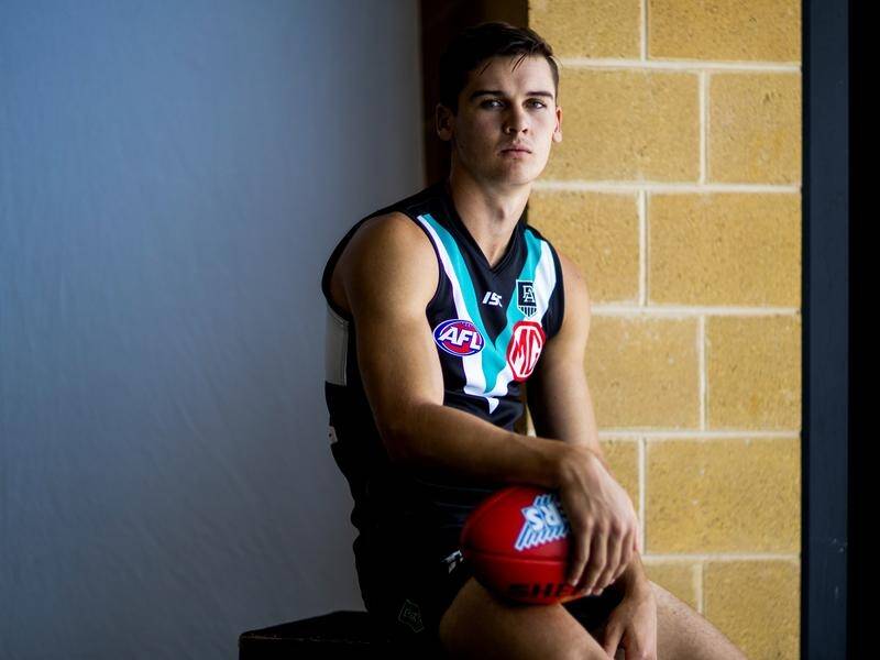 Port Adelaide utility Connor Rozee will miss the start of the AFL because of foot surgery.