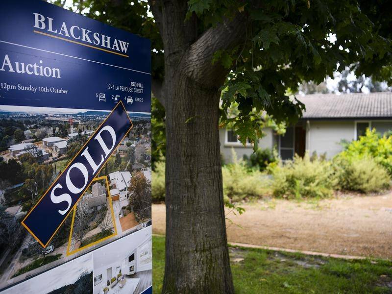 Another interest rate hike is expected when the RBA meets, placing further pressure on homeowners. (Lukas Coch/AAP PHOTOS)