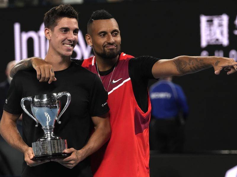 Friends Nick Kyrgios (R) and Thanasi Kokkinakis have been drawn against each other in the US Open. (AP PHOTO)