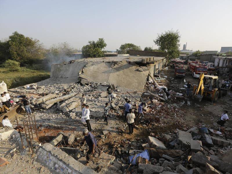 Authorities in western India say a blast at a cotton factory warehouse has killed 12 people.