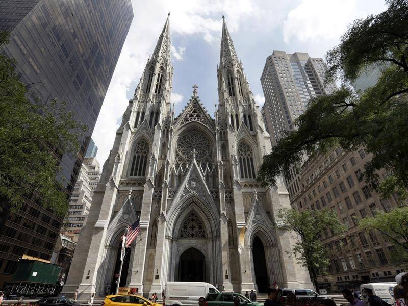A man is under arrest after entering New York's St Patrick's Cathedral with fuel cans and a lighter.