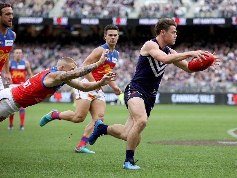 Lachie Neale denies a fallout with Dockers coach Ross Lyon influenced his move to Brisbane.
