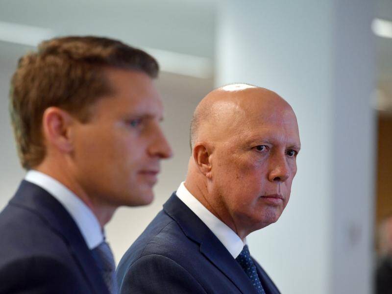Defence Minister Peter Dutton has warned Australian firms to expect cyber attacks from Russia.