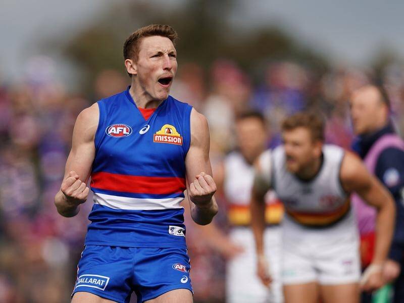Bailey Dale's five goals have led Western Bulldogs to a win over Adelaide and into the AFL finals.