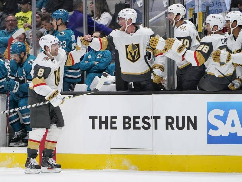 Phil Kessel (8) celebrated his record-breaking 990th straight NHL match with a goal at San Jose. (AP PHOTO)