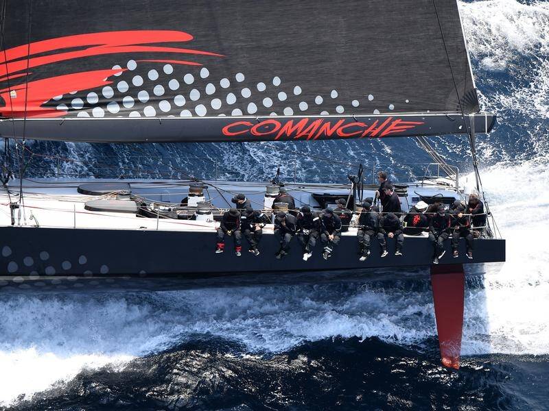 Supermaxi Comanche has taken line honours in the 75th edition of the Sydney to Hobart.