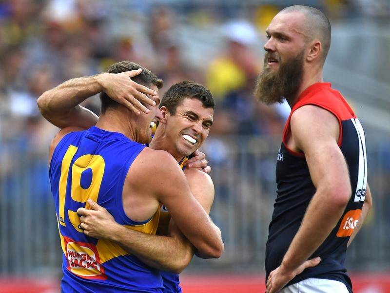 West Coast have powered into the AFL grand final by demolishing the resurgent Melbourne in Perth.