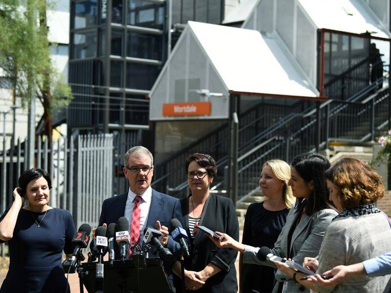 School kids will get free transport on NSW public buses trains and ferries under a Labor government.
