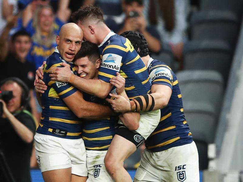 Parramatta's Mitchell Moses (2nd l) scored two tries in their elimination final rout of Brisbane.