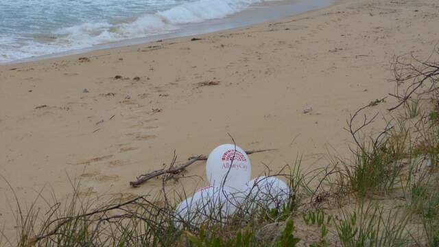 A concerned beach walker says releasing helium balloons can cause problems for marine life.