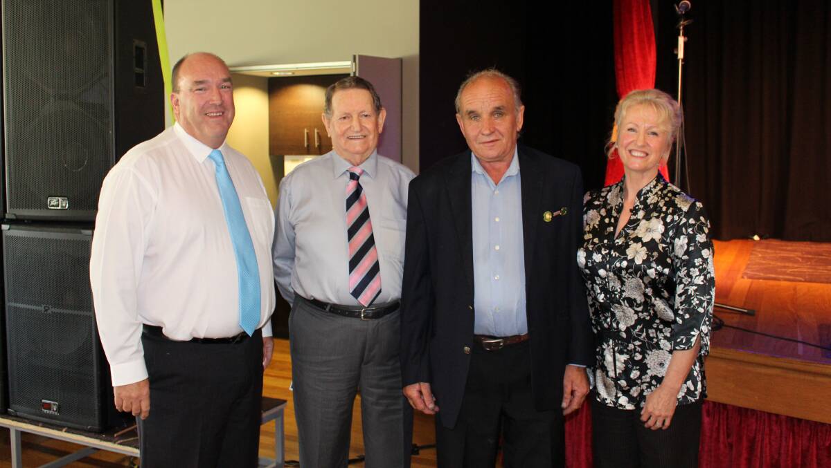 Senior Citizens of the Year John “Jim” McGrath and Allen Collins are congratulated by councillors Russell Fitzpatrick and Ann Mawhinney.