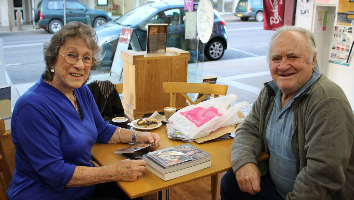 Country music legend Joy McKean signed books for fans at Candelo Books on Monday. Doug Legge from Bega enjoyed meeting with Ms McKean and first saw her perform when he was 12.