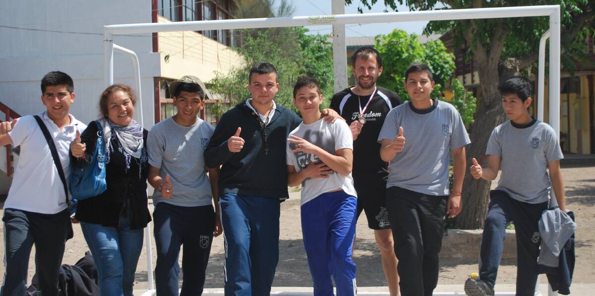Bega man Daniel Boyle (third from right) lives in Santiago, Chile, where he started teaching children English through sport. Photo: Francisca Borquez.