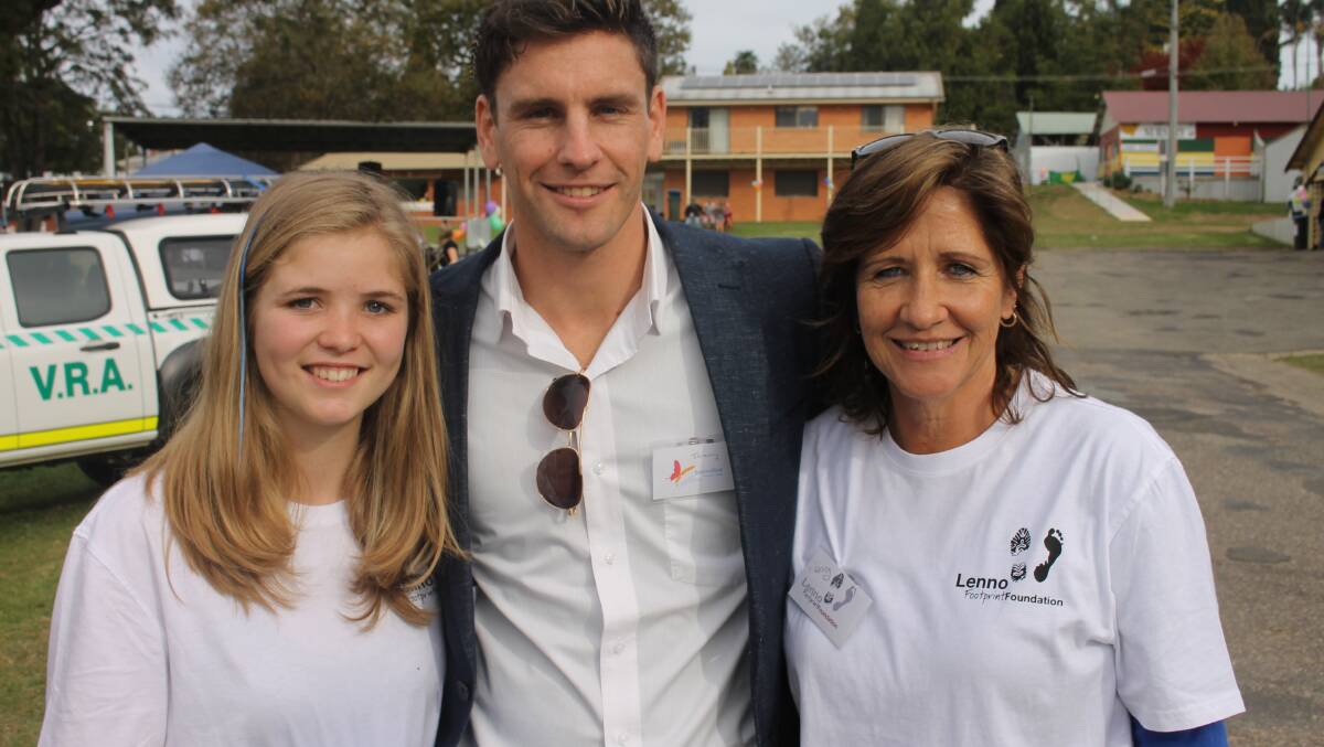 Catching up at Sunday’s Lenno Footprint Foundation Family Fun Day are (from left) Tully Clifton, Jeremy Hubbard from beyondblue and event organiser Jenny Wells. 