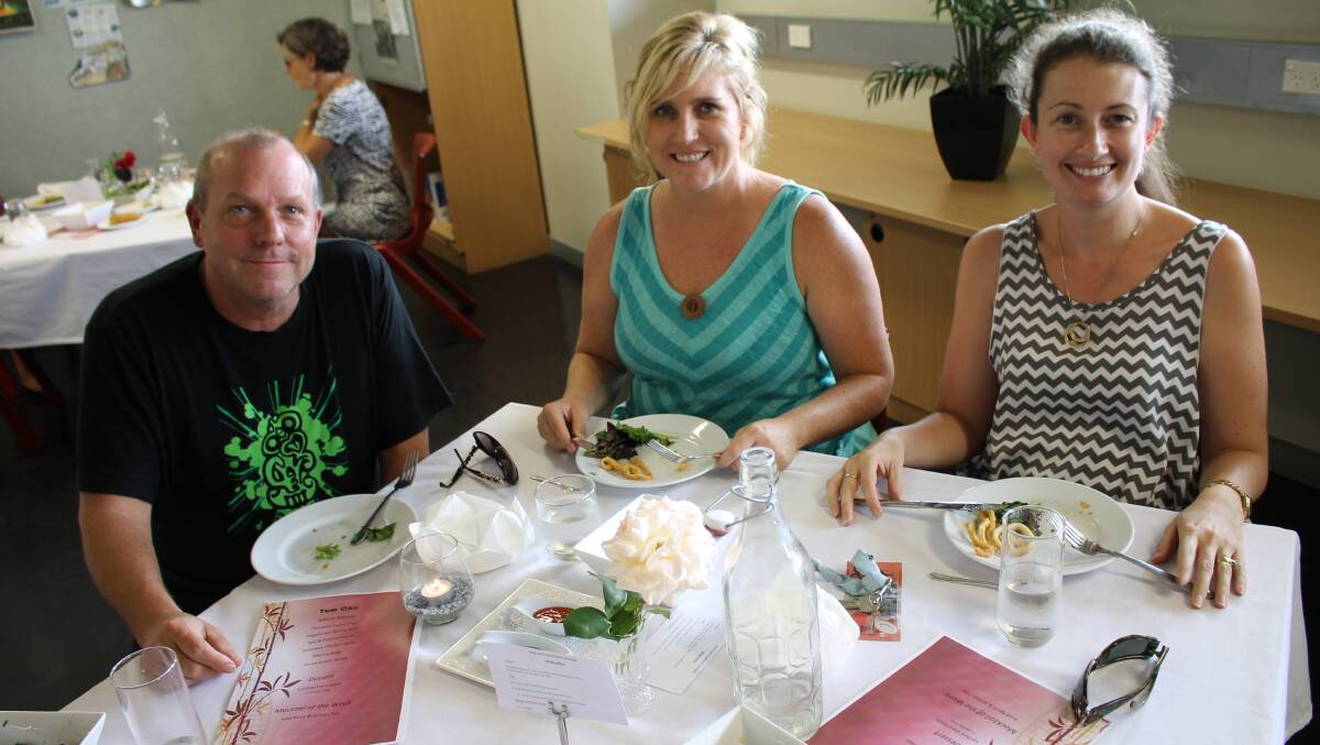 Enjoying their meal at the launch of Café Nevaeh are (from left) Don Green, Seanine Cooper and Jess Harris.