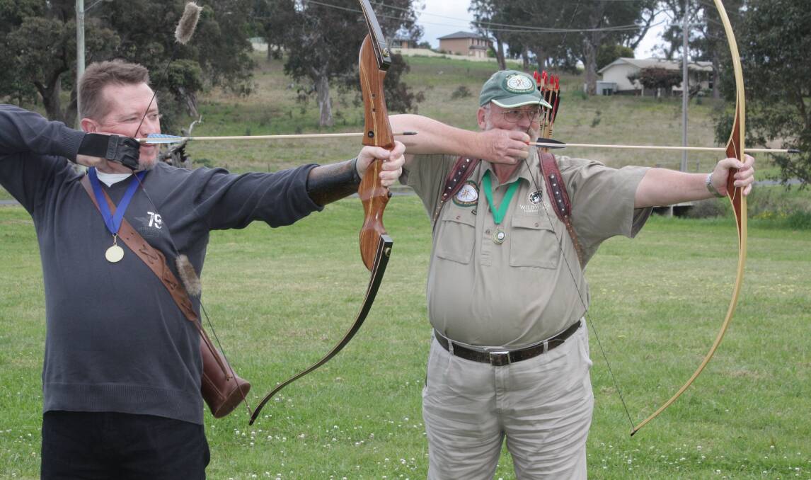 Members of the Bega Valley Traditional Archers Garry Mallard and James Murray.