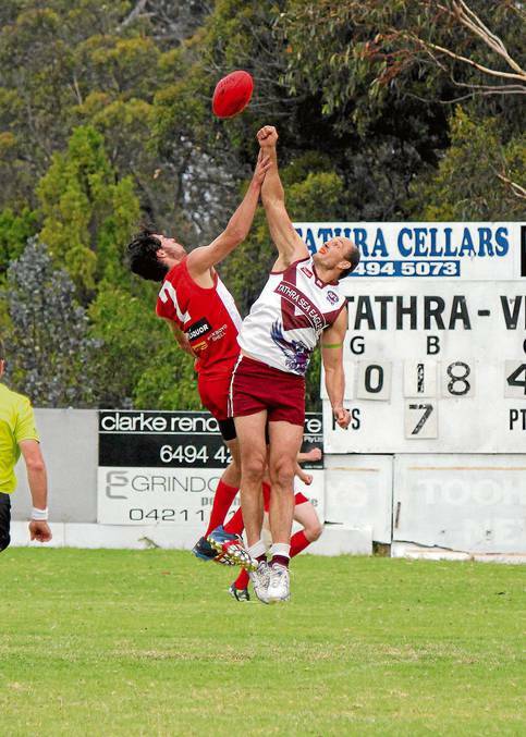 Tathra's David "Croc" Little flies high in the ruck against Eden. The Sea Eagles host Bermagui on Saturday.