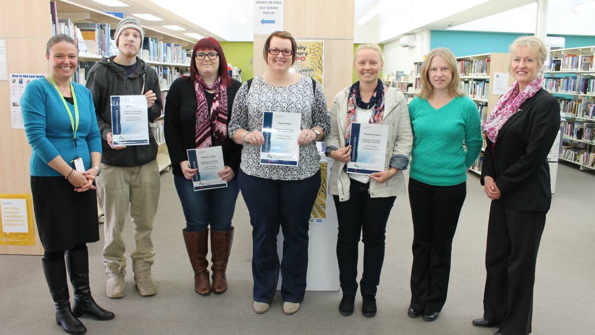 Recipients of this year’s Bega Valley Shire Council Youth Tertiary Scholarships are (second from left) Keith Ashurst, Kylie-Ann Tighe, Sophie Wilton and Stephanie Pearce with UOW Bega’s Samantha Avitaia (left) and from Bega Valley Shire Council, community development officer Donna Campbell and Cr Ann Mawhinney. 