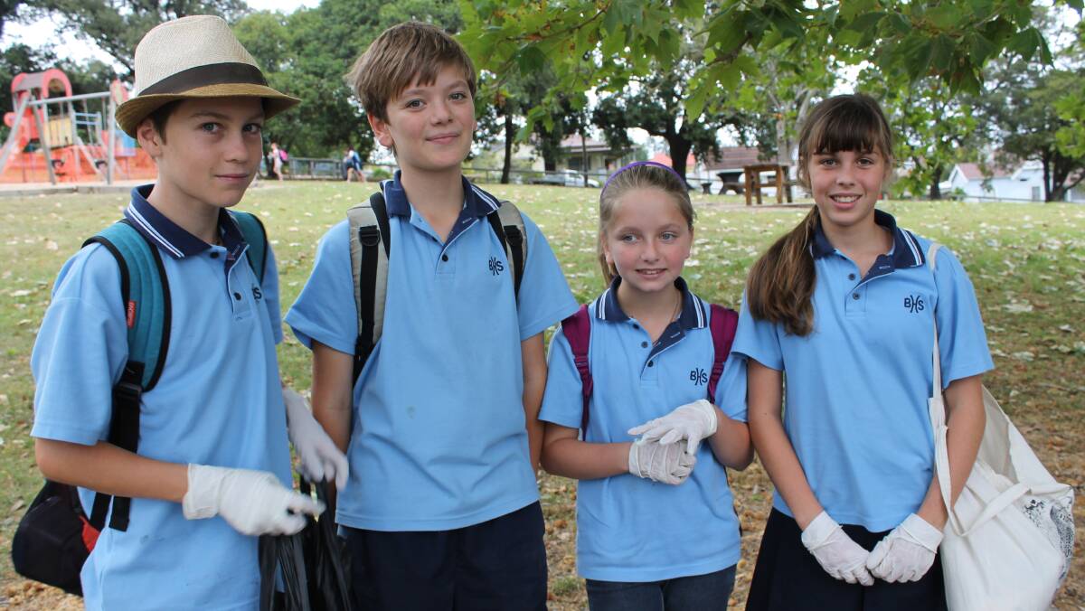 Helping to clean up Bega Park are (from left) Liam Sutherland, Eli Badger, Jackie Wilson and Lili Armstrong.