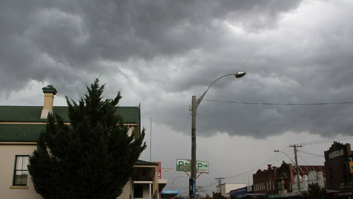 The sky above Bega's main street minutes before the heavens opened in a wild but brief downpour.