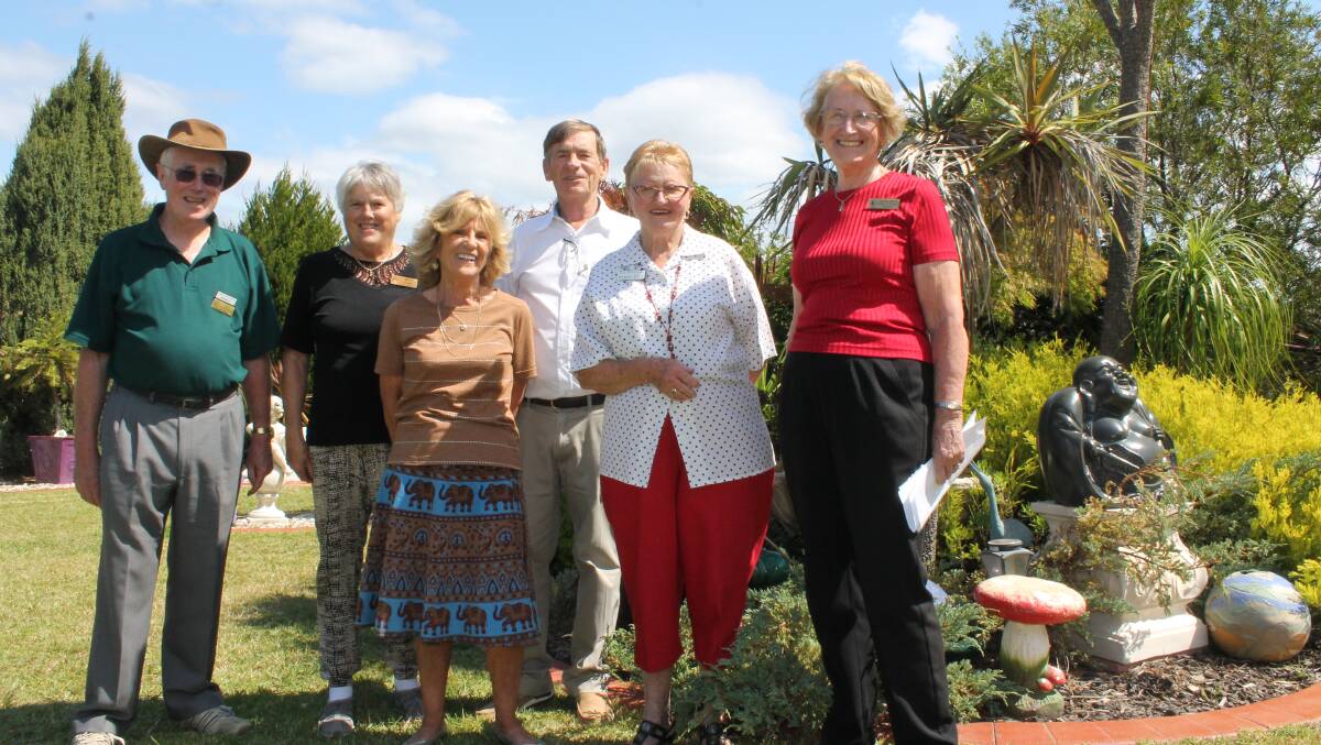 President of the Horticultural Society of Canberra John Le Mesurier (left) chats with HSC council member and tour organiser Bev Leahy, former secretary of Bega and District Garden Club Dianne Campbell, Bega garden club president Bill Campbell, and members Margaret Evans and Carleen Maley.
