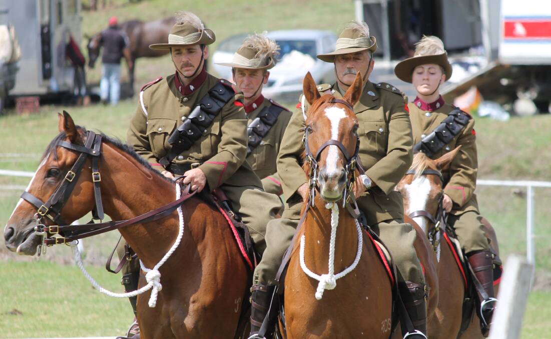 The 7th Light Horse Regiment performed military formations in the ring.