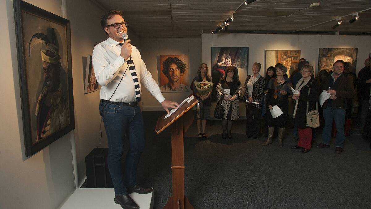 Iain Dawson addresses the crowd at the Shirley Hannan National Portrait Award opening night. Photo: Peter Smith.