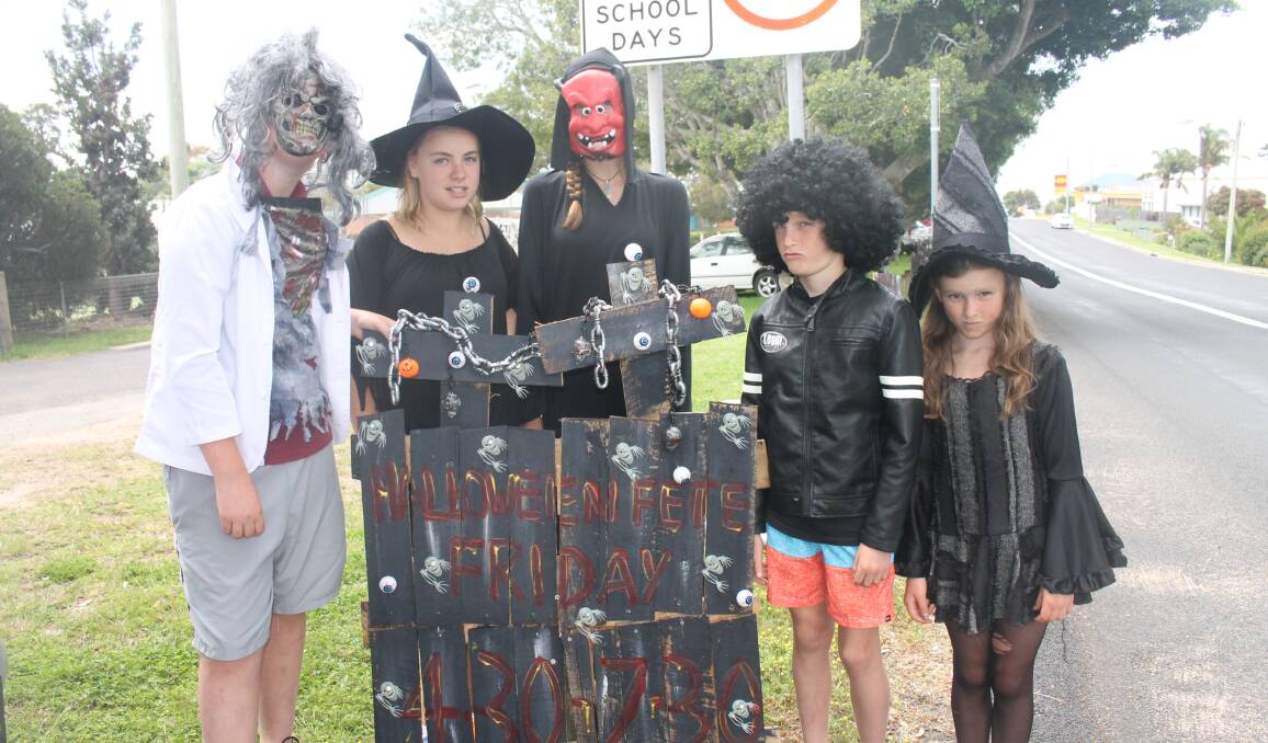 Duke Creary, Brooke Kennedy, Lucy Little, Brock and Taia Creary get in a bit of scaring practice in preparation for Tathra Public School's Halloween-themed fete.