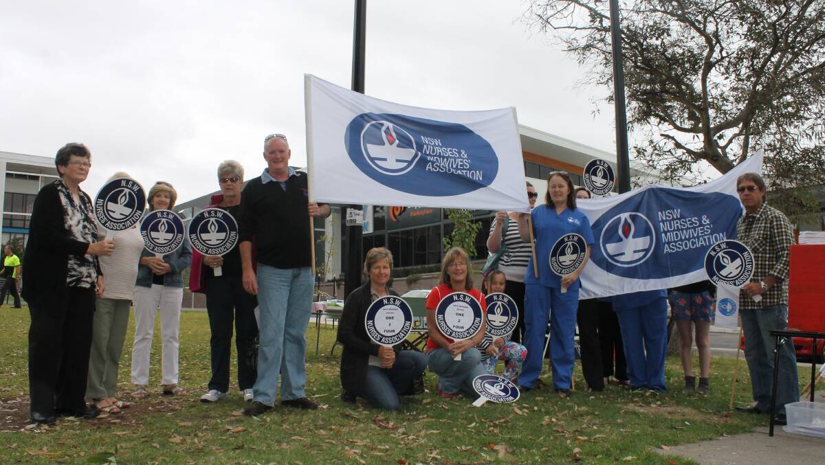 A NSW Nurses and Midwives’ Association rally in Bega in 2013 with Amanda Gillies (holding banner, right) saying the local branches will continue the fight for safer nurse-patient ratios this year. 