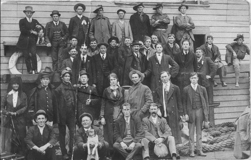 Some of the first Bega men to enlist during World War I, 1914, on Tathra Wharf, waiting to embark on ship "Merimbula". Photo courtesy of the State Library of NSW.