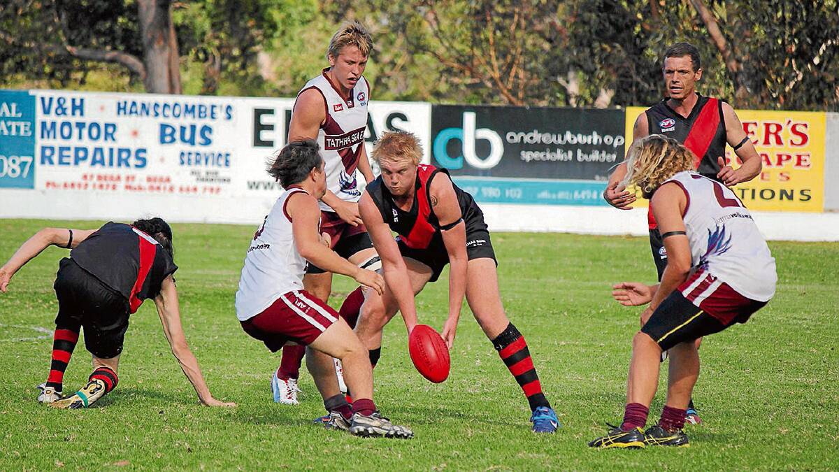 Bomber Cody Hazelgrove-Danvers scurries for possession against the Tathra Sea Eagles recently. Hazelgrove-Danvers will ine up as ruckman for Friday night's game. 