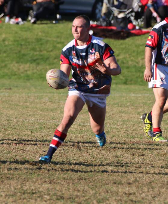 • Hayden Parbery flicks a pass during the Indigenous round against Eden recently. The Roosters are sitting equal first with Moruya and will host the Sharks this Sunday. 
