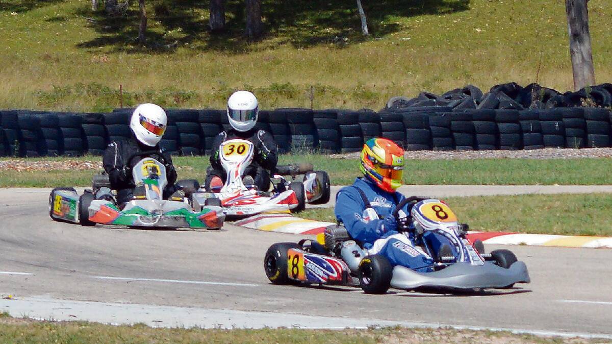 • Frogs Hollow kart racer Jack Loftus (right) leads the final of the senior national pro class ahead of Leigh Johnston-Crawley and William Lucas during the Sapphire Cup recently. 