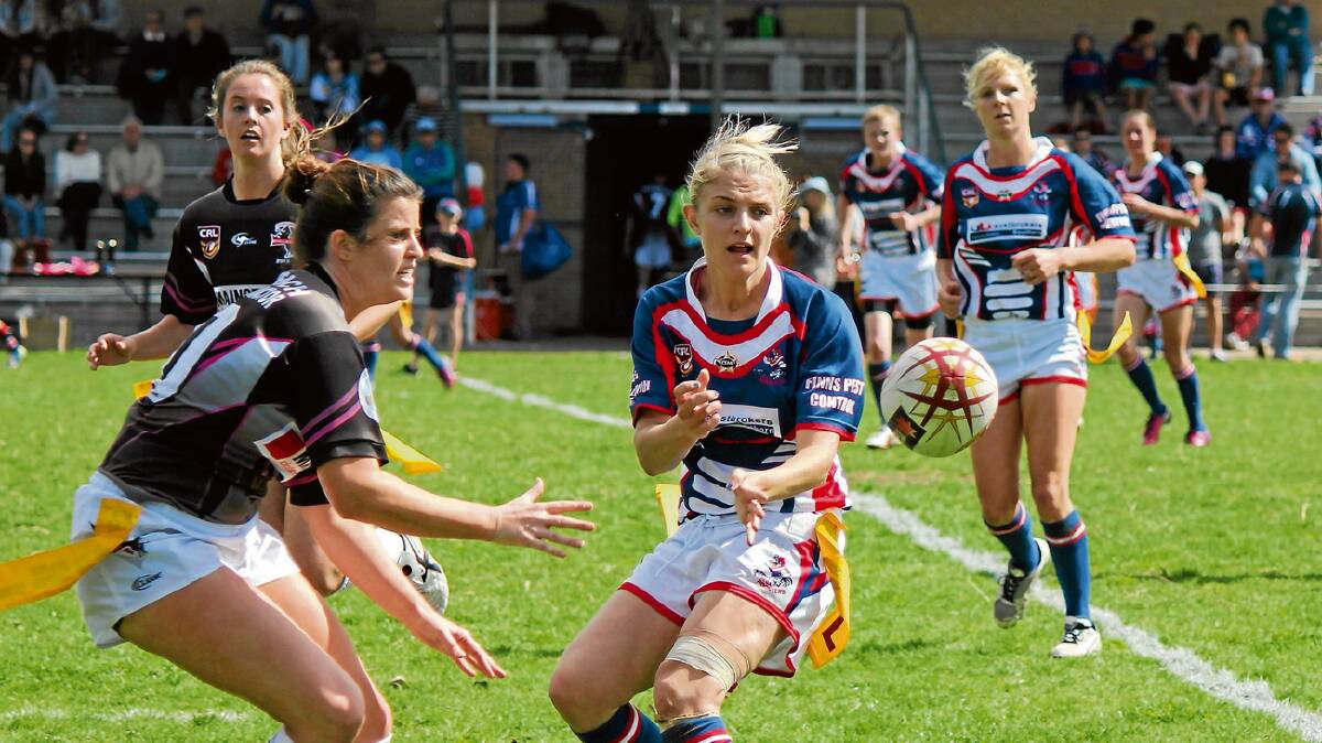 • Tegan Mundy offloads during last year’s grand final where her try won her player of the match. The Group 16 pre-season final will kick off with a rematch of the Chicks against the Cooma Fillies. 