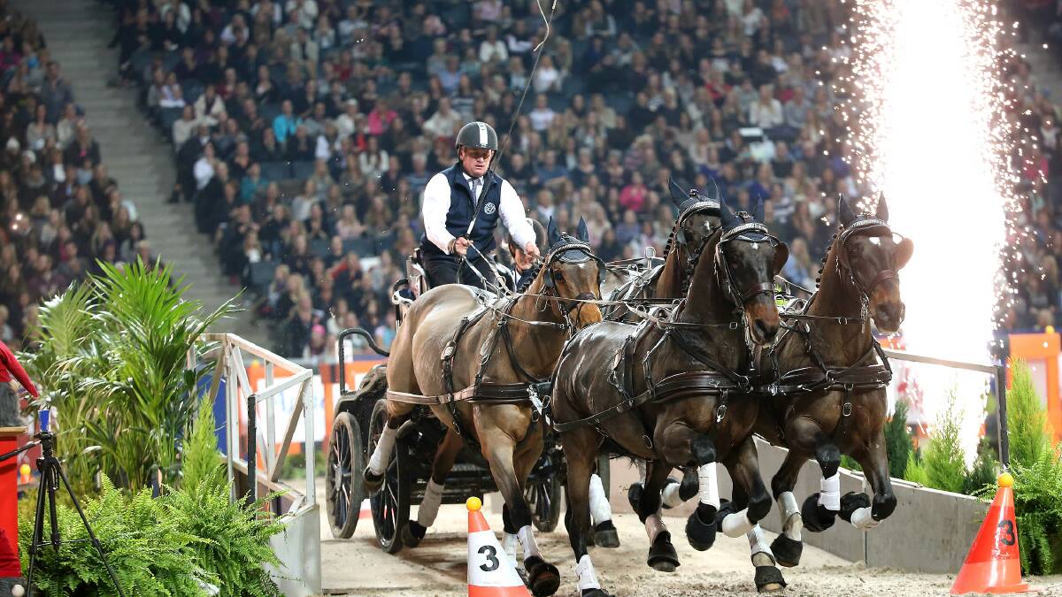 • Boyd Exell gracefully leads his team around the track in Stockholm in round two of the World Cup late last year.  Photo courtesy of Roland Thunholm/FEI.