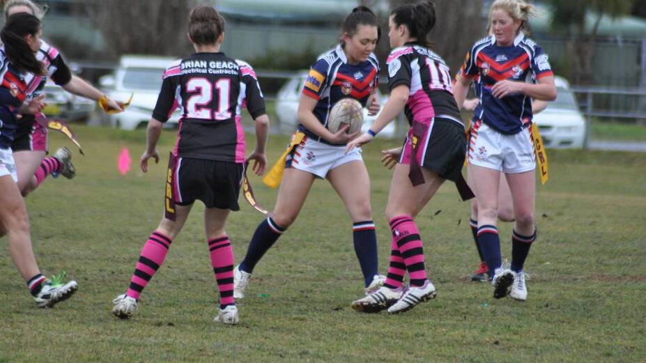 • Alliera Bower-Scott gets nabbed by a couple of Cooma Fillies defenders during Sunday’s game. 