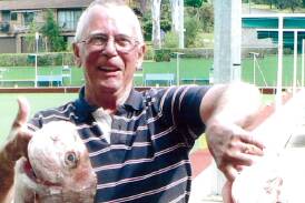 TWO OF A KIND: Fred Eyley is happy with his great lure catch of a couple of two kilogram snappers. 