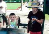 START YOUNG: Mollymook Bowling Club Fishing Club's Lucas Nelson and his big brother Thomas with their catch of luderick.
