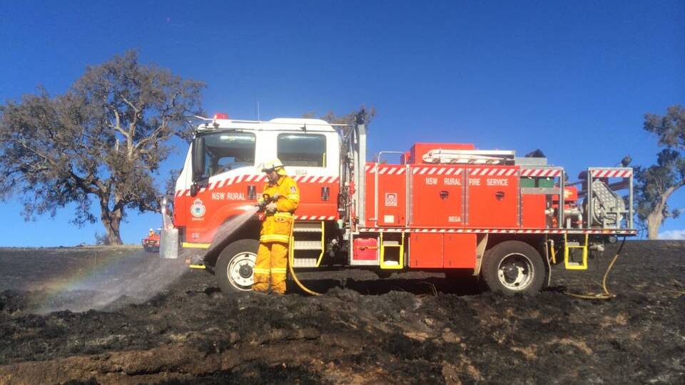 RFS volunteers work to put out a grass fire near Candelo.
Photo submitted by Sam Wilton.