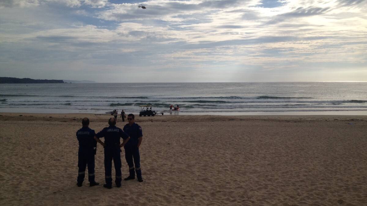 Searchers at the scene of a suspected shark attack at Tathra.  PHOTO: BEN SMYTH,  Bega District News