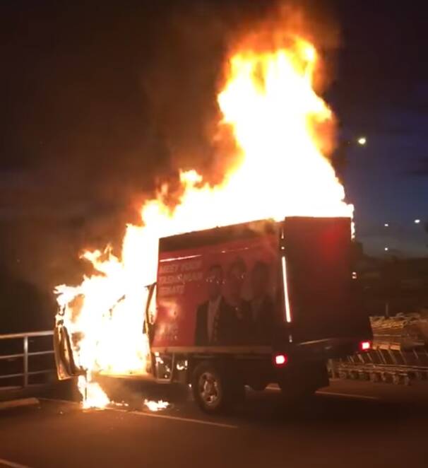 One Nation's billboard vehicle engulfed in flames at Shoreline Plaza on Sunday night.
