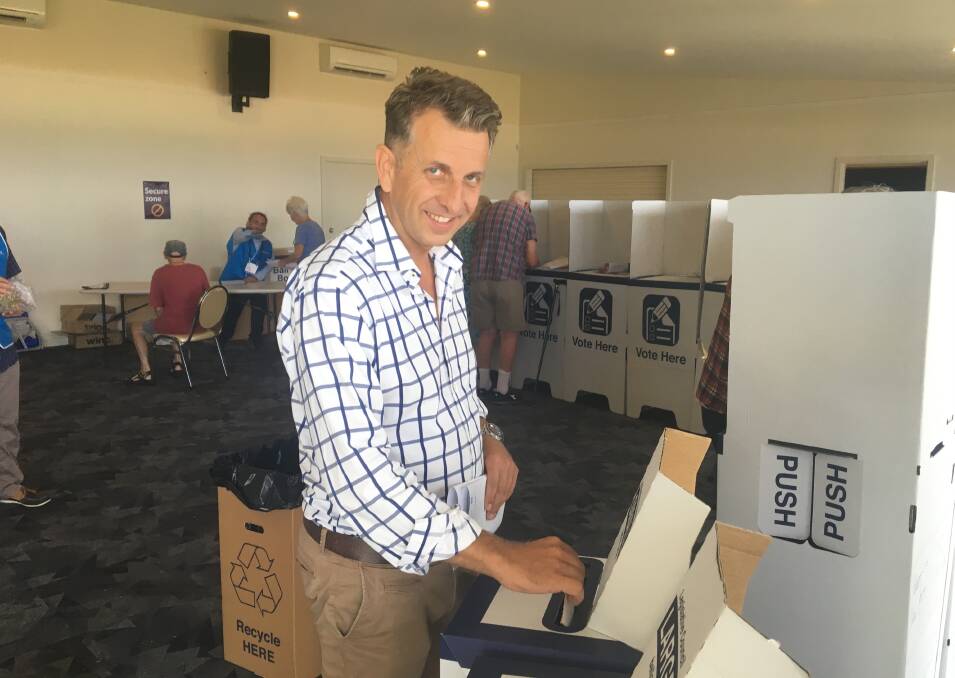 Andrew Constance casts his vote at the Batemans Bay Surf Club during the NSW state election on Saturday, March 23.
