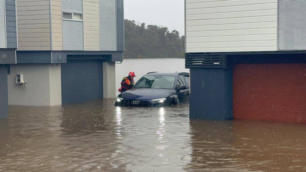 Heavy rain, damaging winds and flooding have struck the Illawarra and South Coast. Pictures by Robert Peet, SES, supplied